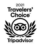 Black and white “2021 Travelers’ Choice Tripadvisor” award logo featuring an owl face within a laurel wreath.